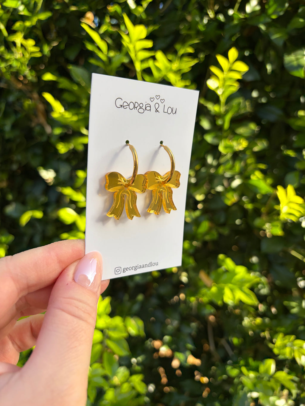Gold Bow Huggie Hoops