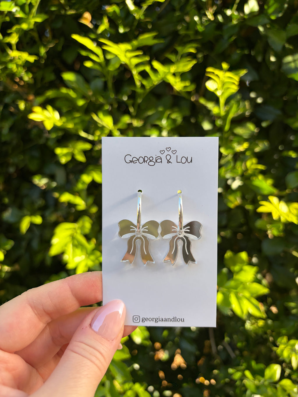 Silver Bow Huggie Hoops