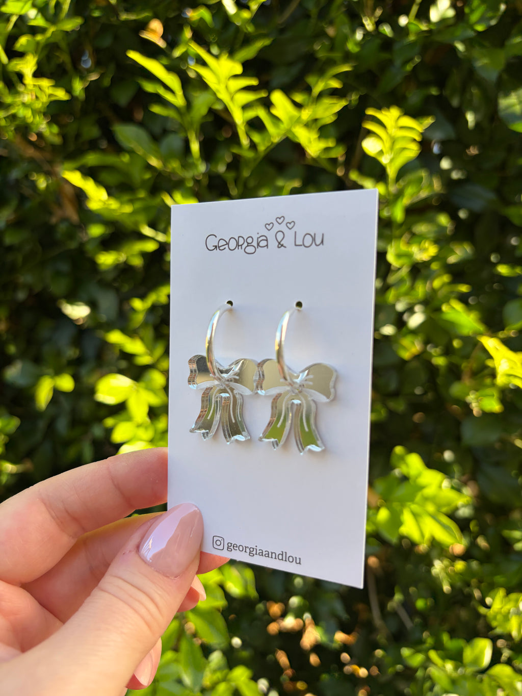 Silver Bow Huggie Hoops