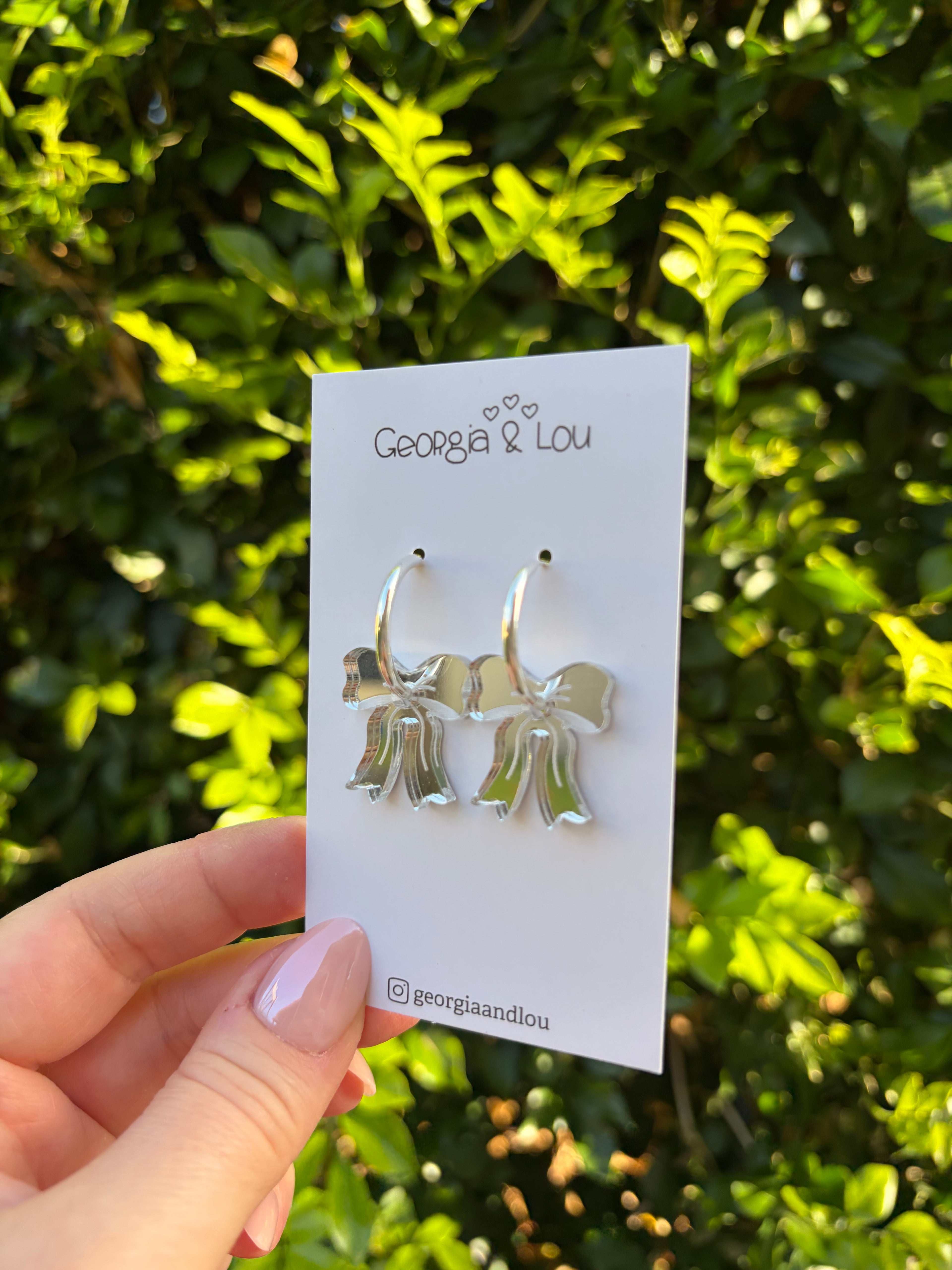 Silver Bow Huggie Hoops