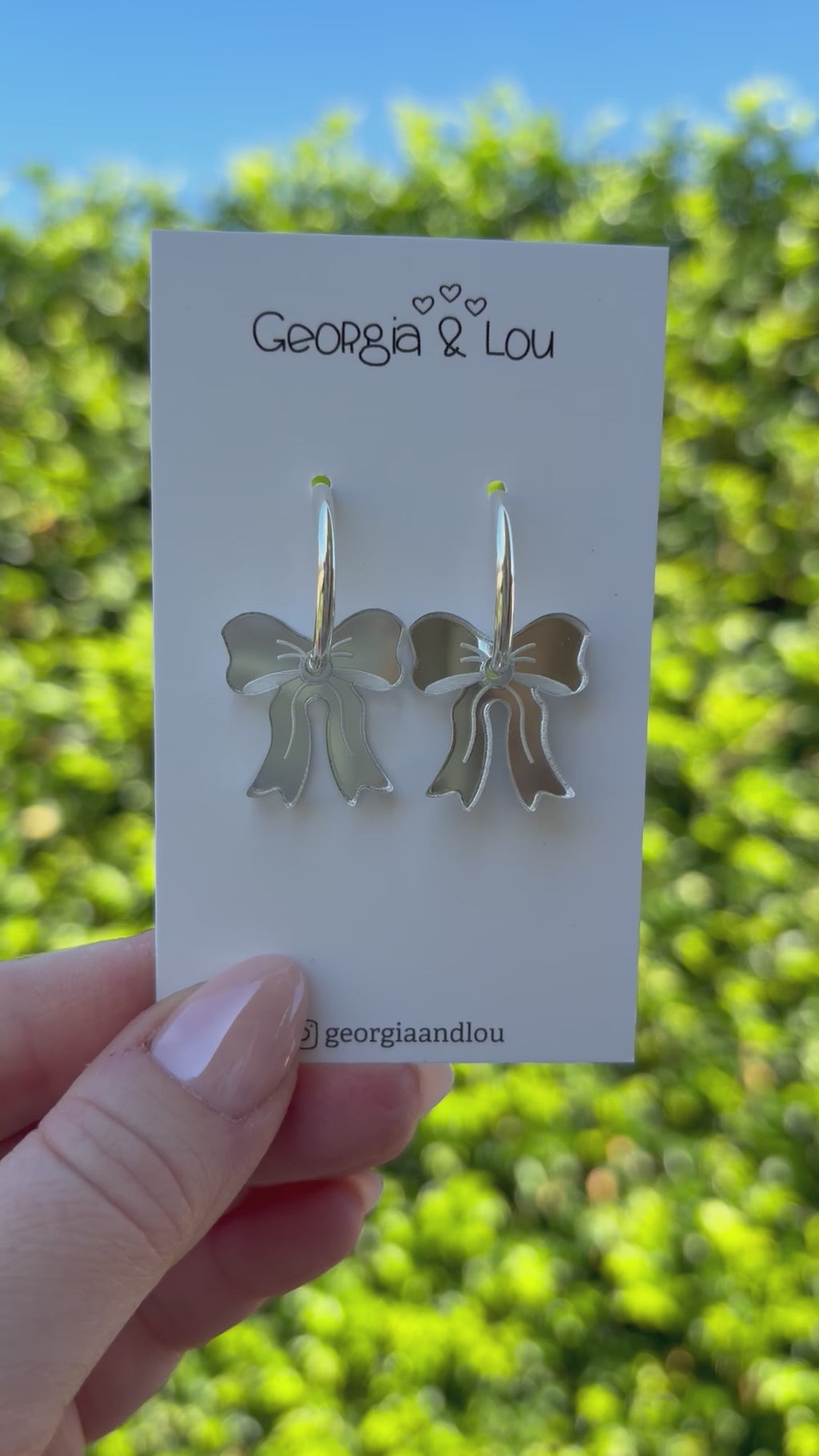 Silver Bow Huggie Hoops